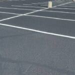 Sealcoating Colorado Springs. Parking lot striping Colorado Springs. Commercial parking lot maintenance services.