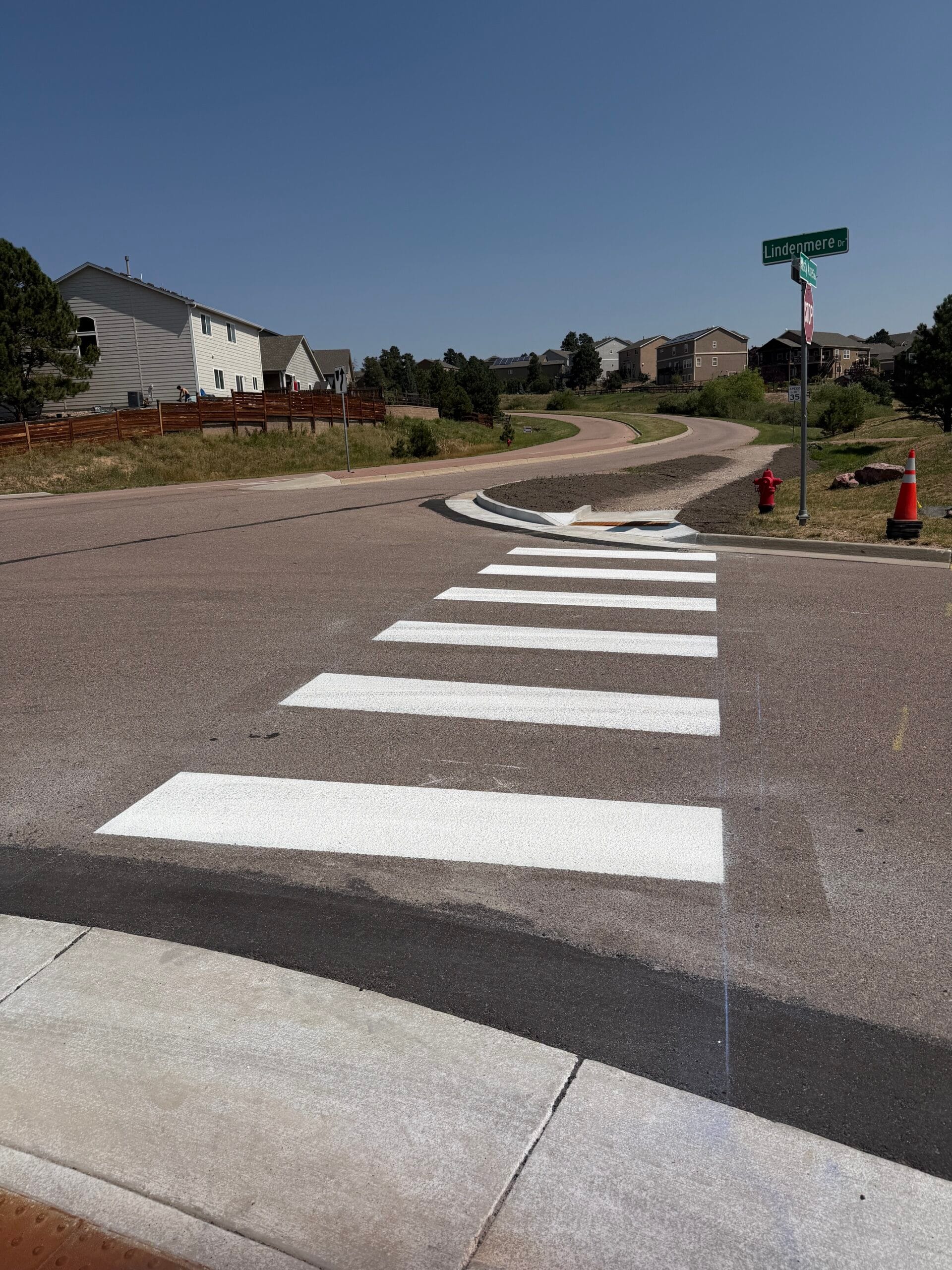 New crosswalk with retroreflective glass beads on a public road